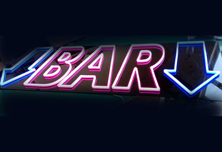 Bar Sign with Arrows in blue and pink - photo from CustomNeon.com