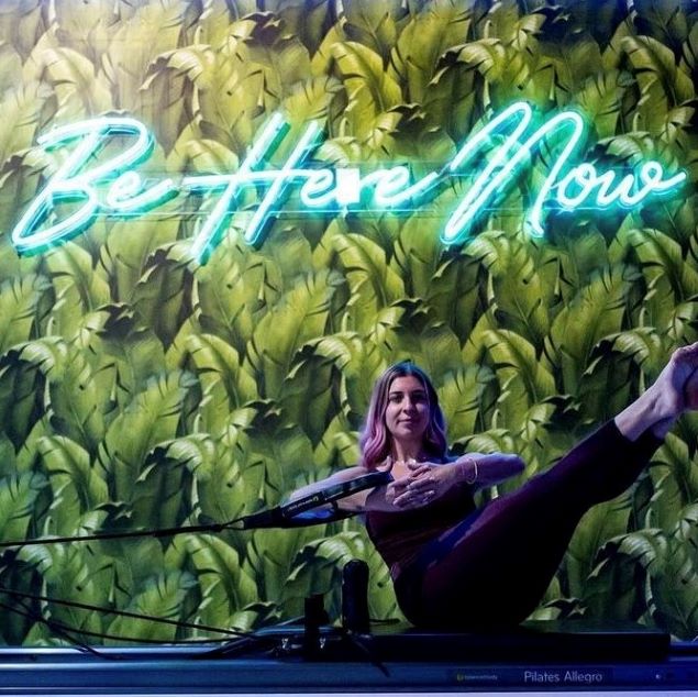 Be Here Now mint green light sign @sensory.fitness pilates studio made by CUSTOM NEON®