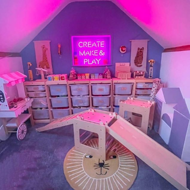 Create Make & Play Neon Sign shown in a kids play room @create_make_and_play