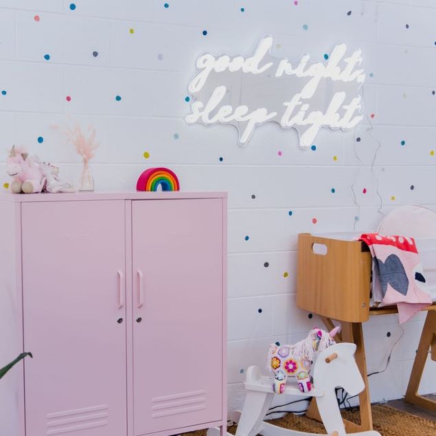 Good Night Sleep Tight white LED nightlight sign on silver mirrored backing wall mounted in a nursery by CUSTOM NEON®