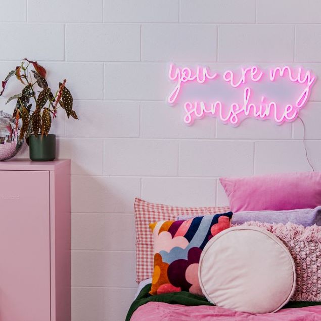 You Are my Sunshine Wall Sign in cotton candy pink LED neon flex on a white acrylic backboard - by CUSTOM NEON®
