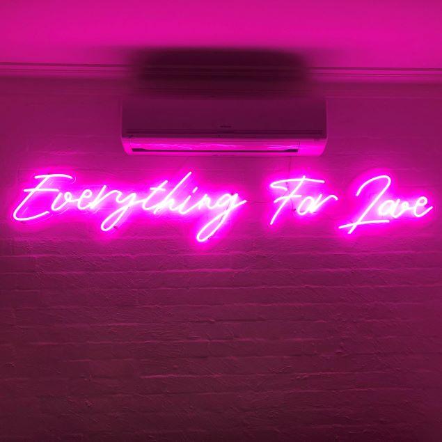 Everything For Love pink LED neon sign on a wall - made by @customneon