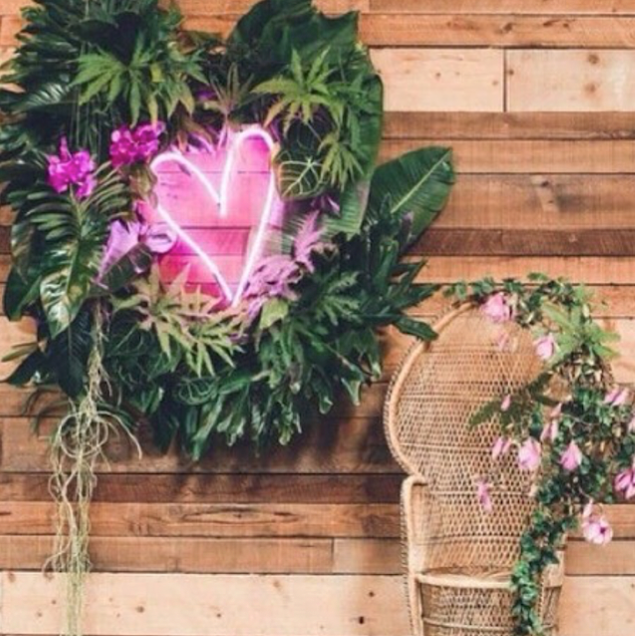 Red love heart neon light on a shelf against distressed wood - from Custom Neon