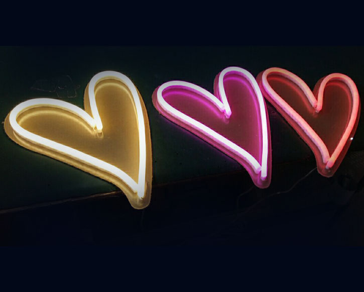 Cute love heart neon lights on colored acrylic backboard in different colors - photos CustomNeon.com