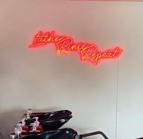 Lather Rinse Repeat red neon light @roots_beautybar made by Custom Neon