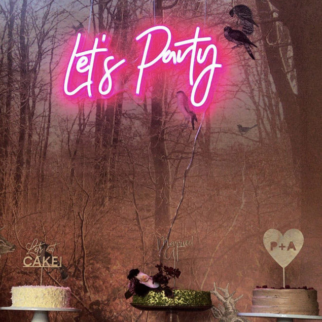 Let's Party portable LED neon sign shown at a wedding expo - photo from CustomNeon.com