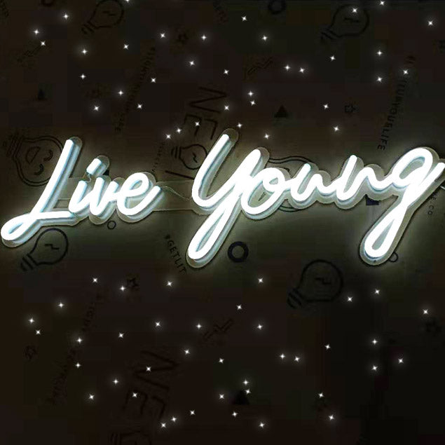 Live Young light up word sign in white LED neon - from Custom Neon®