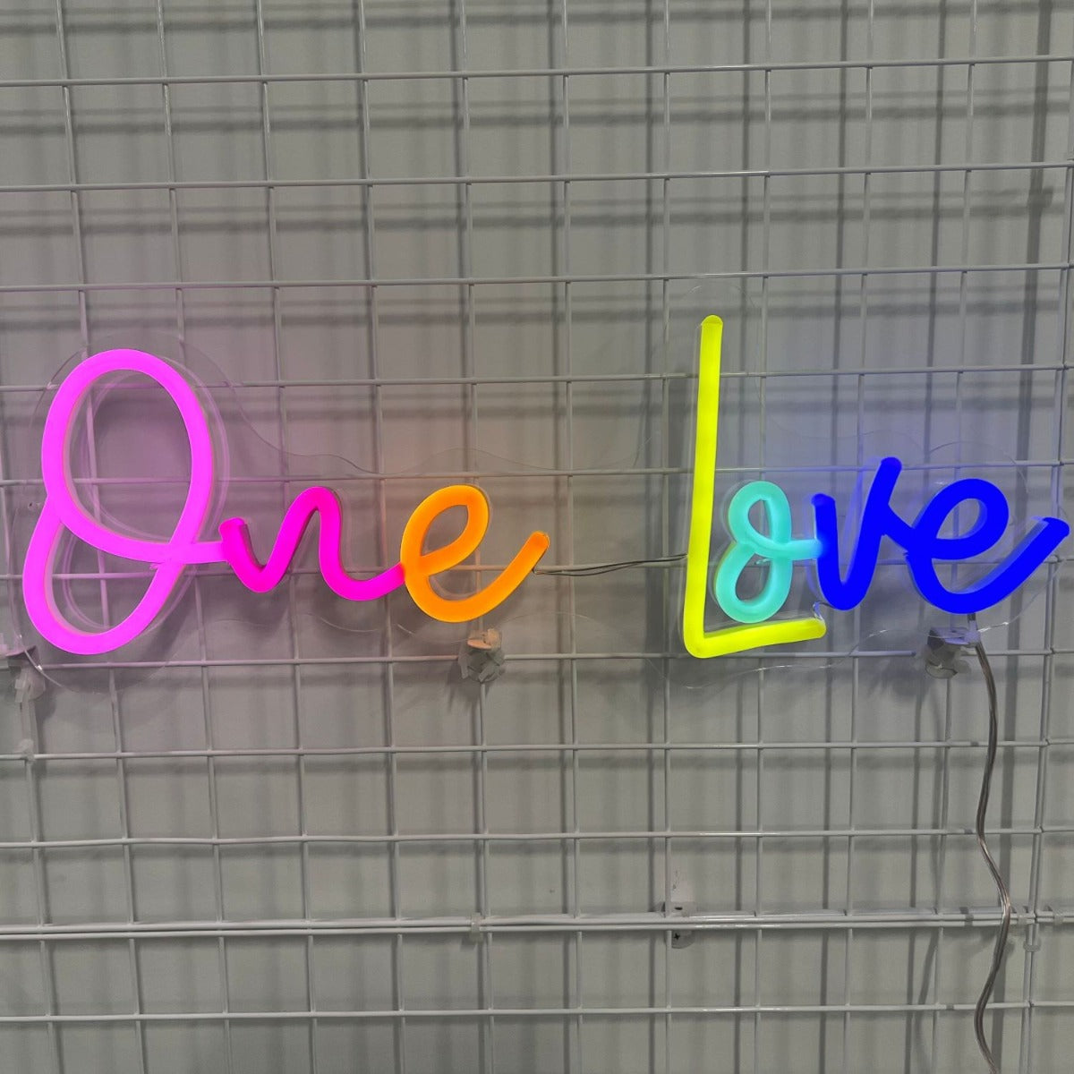 One Love light up word sign in multiple colors from Custom Neon®