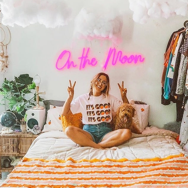 On the Moon LED neon sign shown in a bedroom setting - made by @customneon for @malloryonthemoon