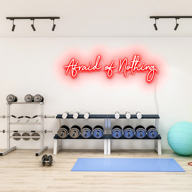 Afraid of Nothing CUSTOM NEON® pre-designed sign shown in red on gym wall