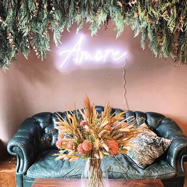 Amore white CUSTOM NEON® sign at a wedding