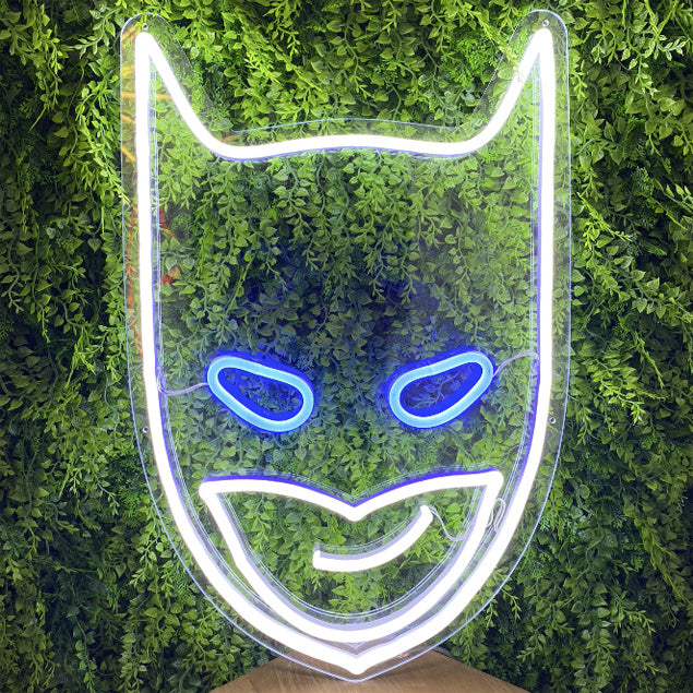 Batman neon light sign shown on green wall - photos from CustomNeon.com
