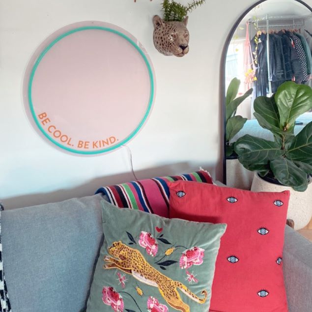  wall mounted above a sofa @customneon Signs of Change charity range