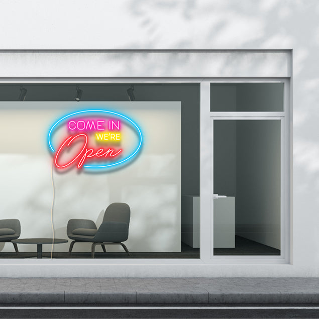 Come In We're Open LED Neon Flex sign in multiple colors and fonts shown in reception area - from CustomNeon.com