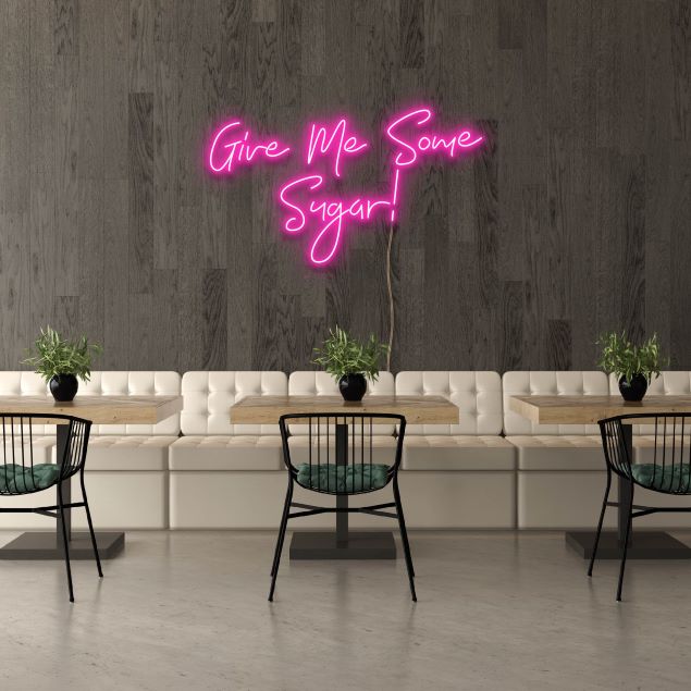 Give Me Some Sugar lighted wall art in pink on a cafe wall - from Custom Neon®