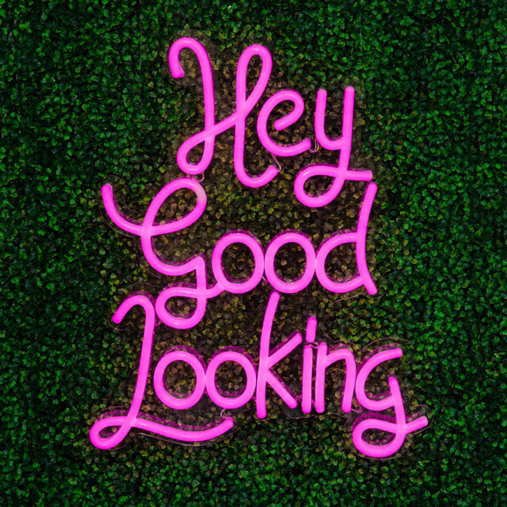 * Hey Good Looking * LED Neon Sign on green wall 