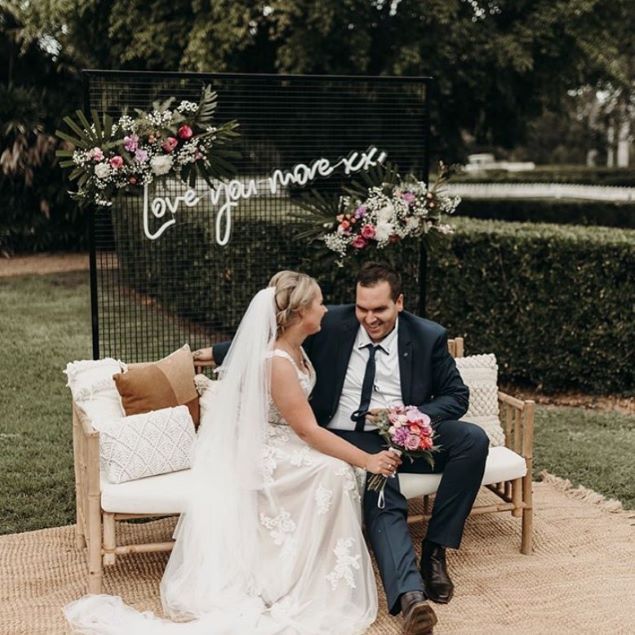 Love you more xx LED neon flex sign shown at a wedding - from Custom Neon®