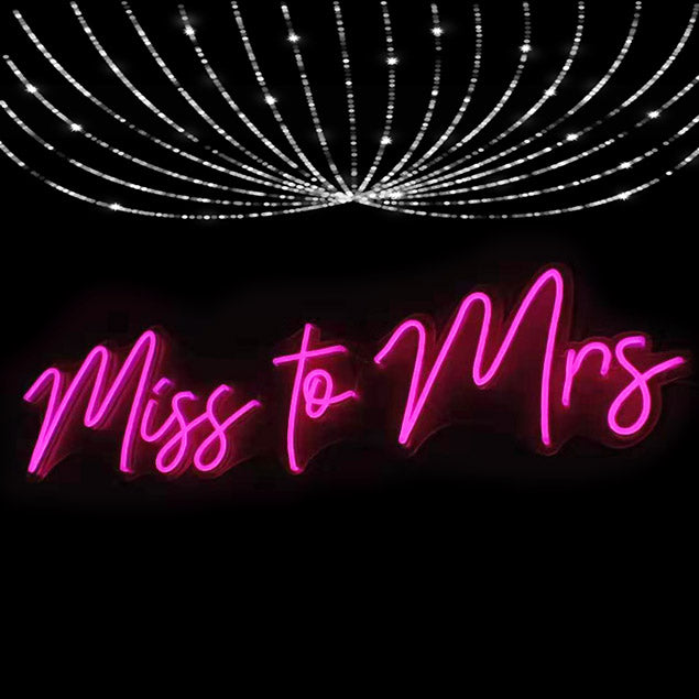 Miss to Mrs pink LED Neon sign in a cursive font - photo from CustomNeon.com