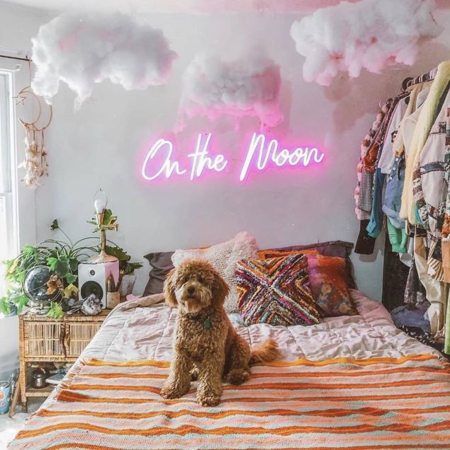 On the Moon LED neon sign wall mounted above a bed  - made by @customneon for @malloryonthemoon