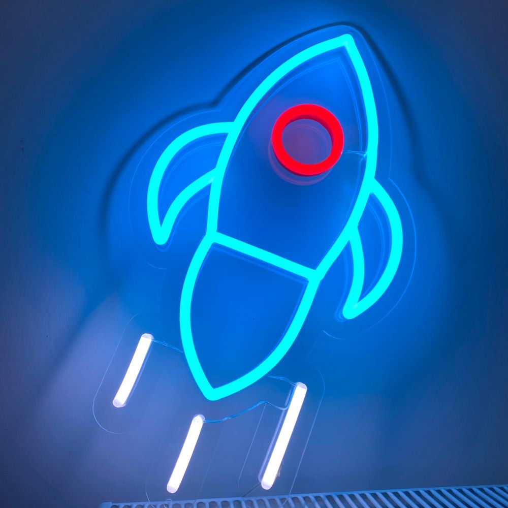 Custom Neon® rocketship artwork in blue red and white