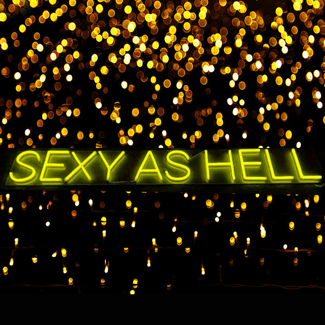 Sexy as hell yellow LED neon sign on acrylic backboard - from Custom Neon®