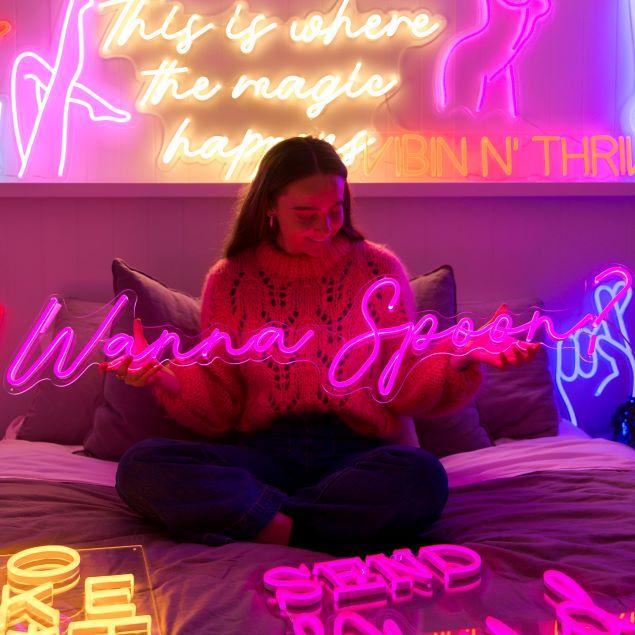Wanna Spoon? Pink LED light sign shown as bedroom decor - from Custom Neon